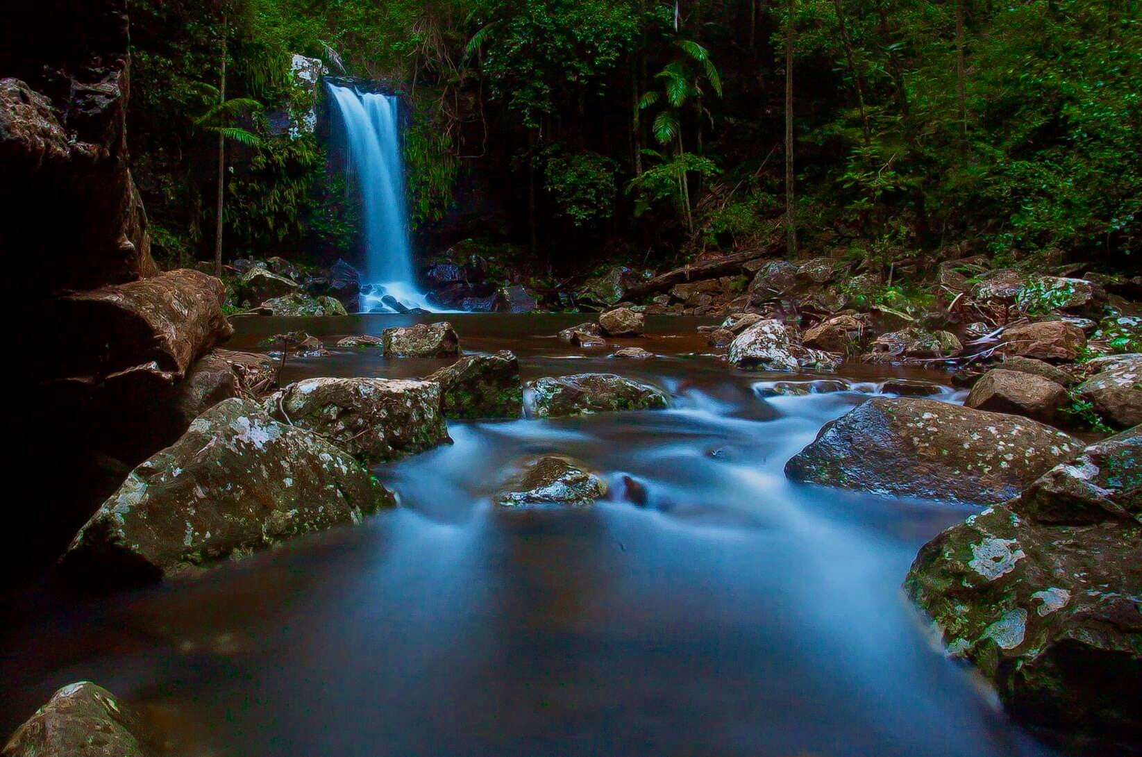 The Healing Sanctuary Waterfall in a Rainforest